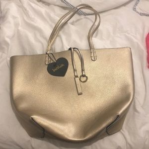Metallic gold handbag